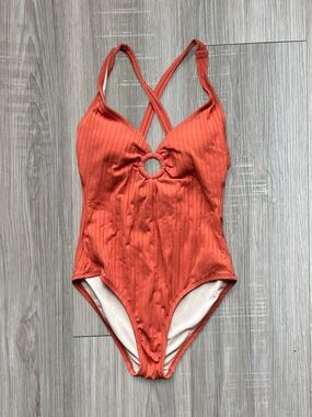 Ribbed orange one piece swimsuit with racer back and cut out detail